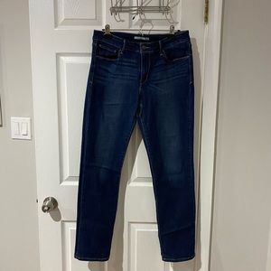 Dark blue Levi’s mid rise skinny jeans size 12